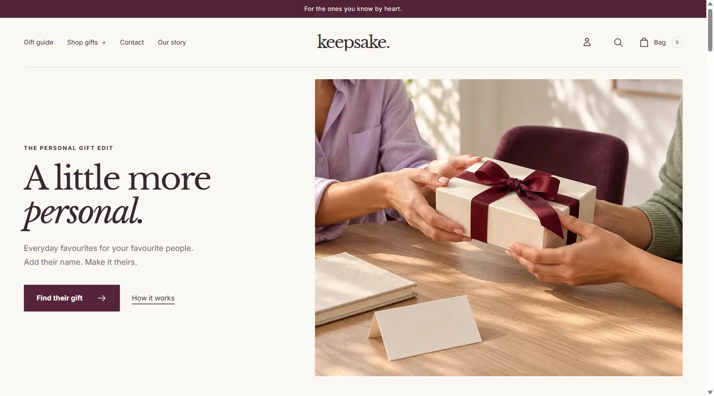 Keepsake theme storefront with editorial typography and a photograph of a wrapped gift.